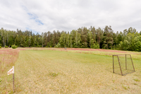 Futbolo laukas stovykloje miniatiūra